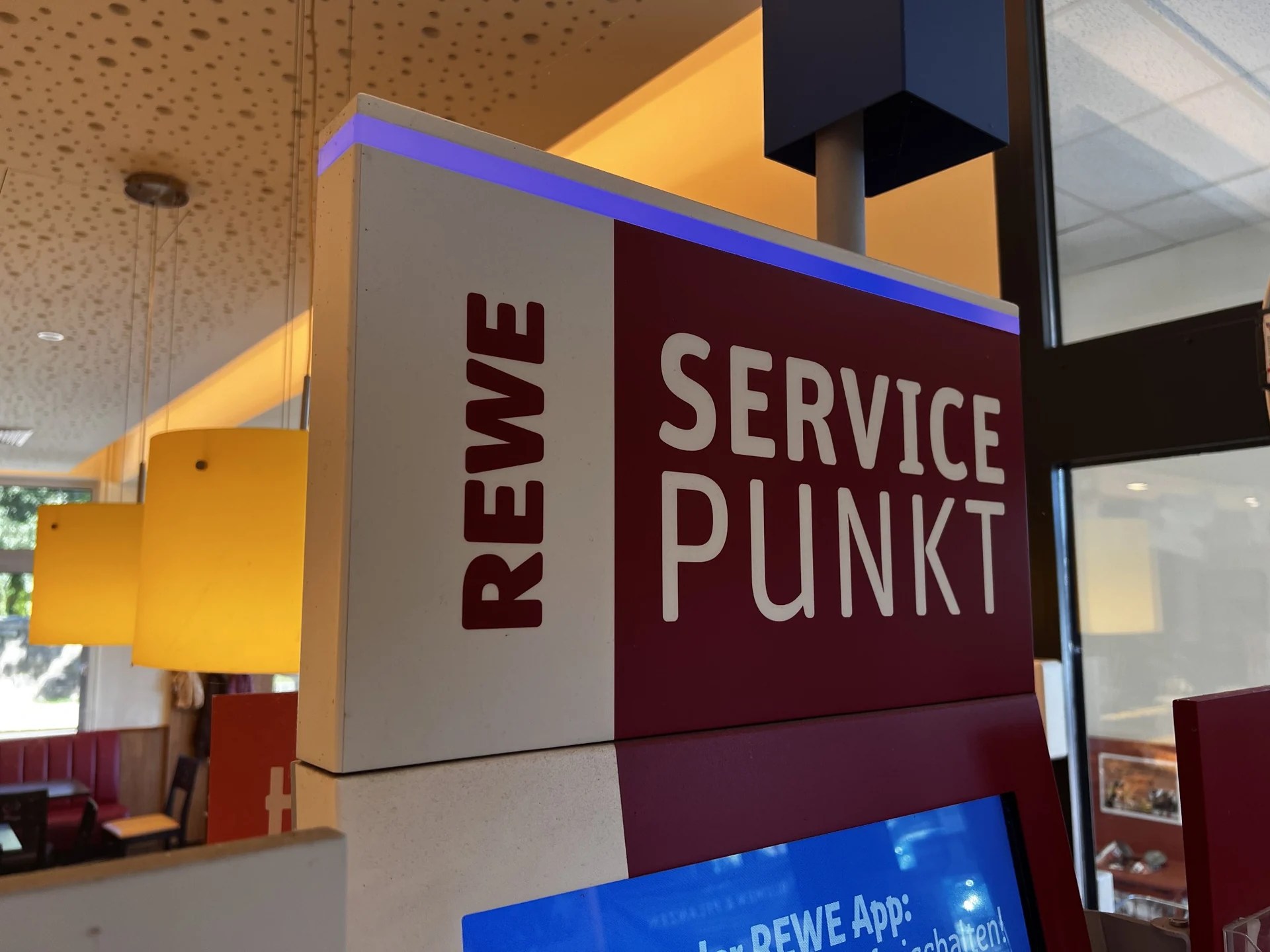 Reference photographs of the REWE service point, documenting its appearance and dimensions for the 3D model — 1